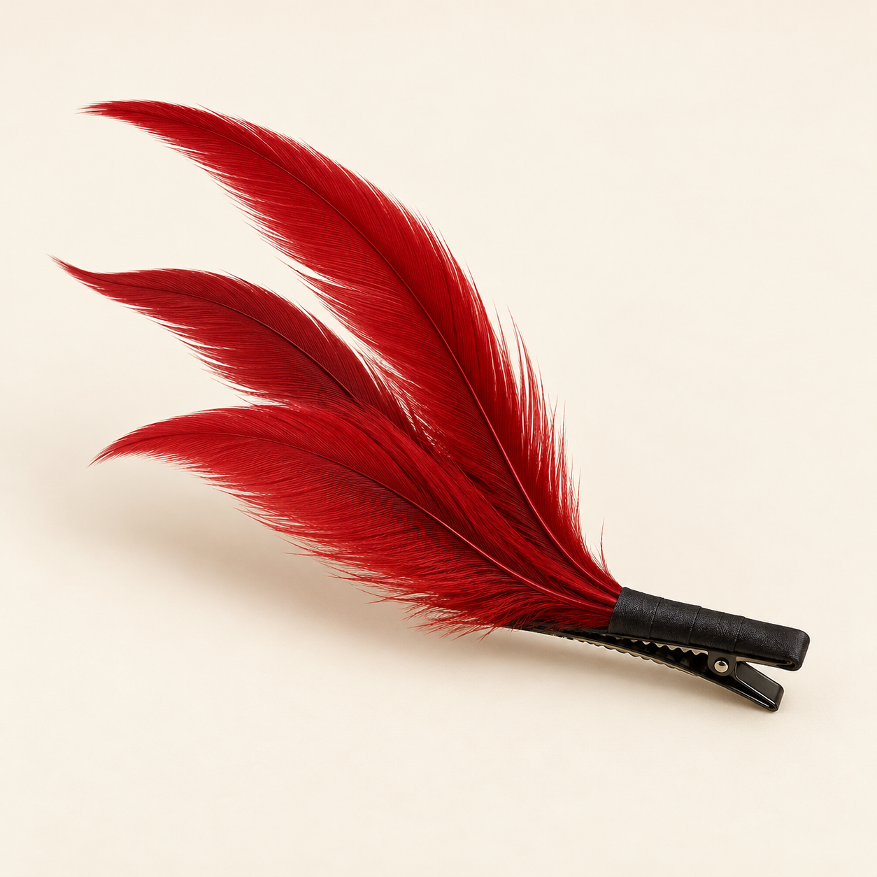 Brisa Scarlet: Three slender scarlet feathers in a diagonal sweep.