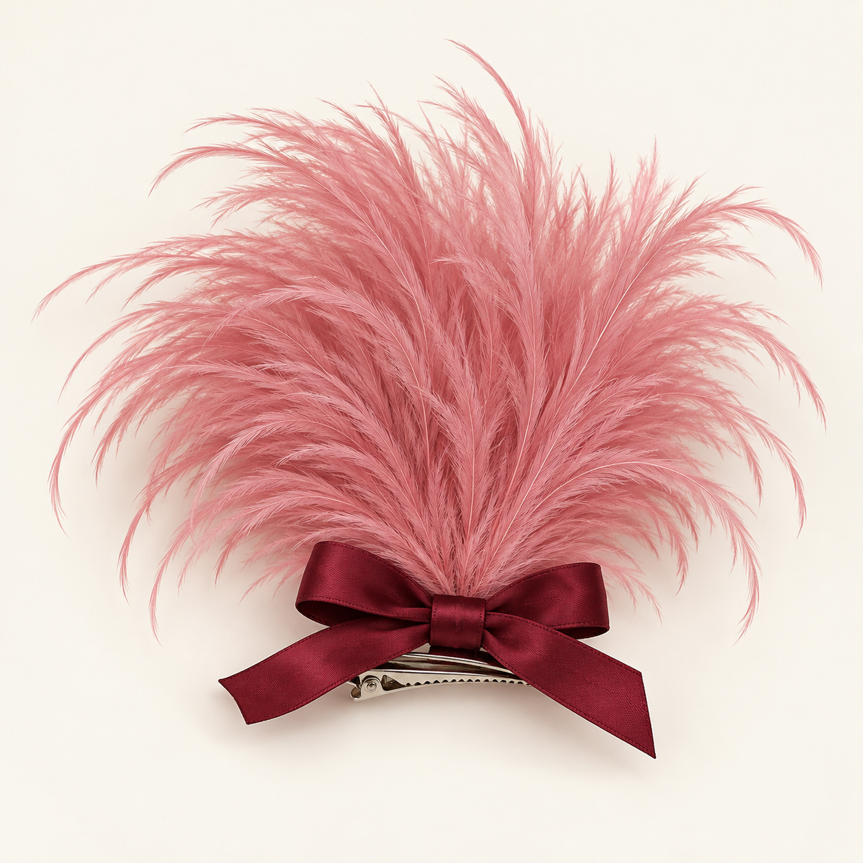 Fiesta Rose: A rose pink feather tuft finished with a burgundy satin bow.
